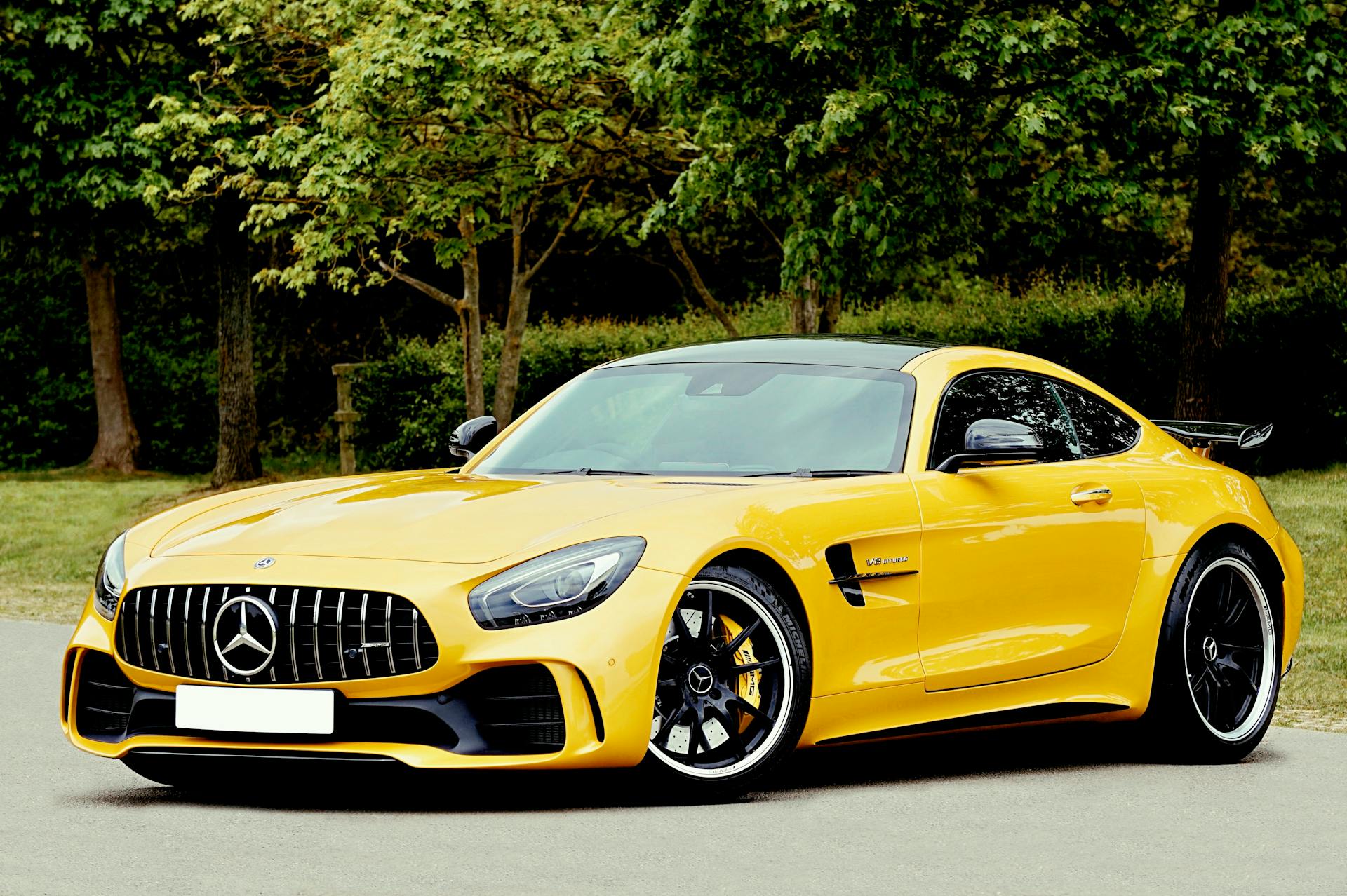 Yellow Mercedes Benz car