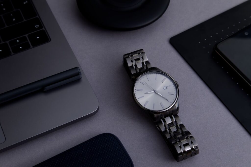 Metal strap analog watch with white dial